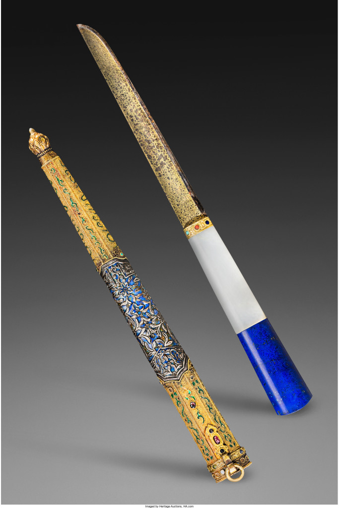 A fine and very rare Chinese imperial hunting knife with enameled gold and silver sheath ($50/70,000) is from the Qing Dynasty, Qianlong period, circa 1735-1796.