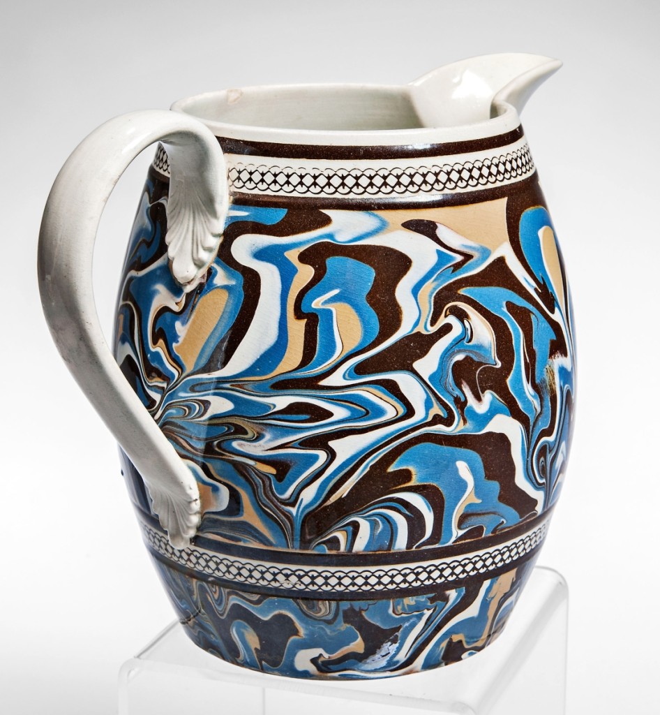 The sale started with mocha from the Jonathan Rickard collection, and this was the most popular piece. The 9-inch slip-marbled pearlware jug, circa 1800, was predominately blue with swirls of brown, yellow and white. It realized $8,610.