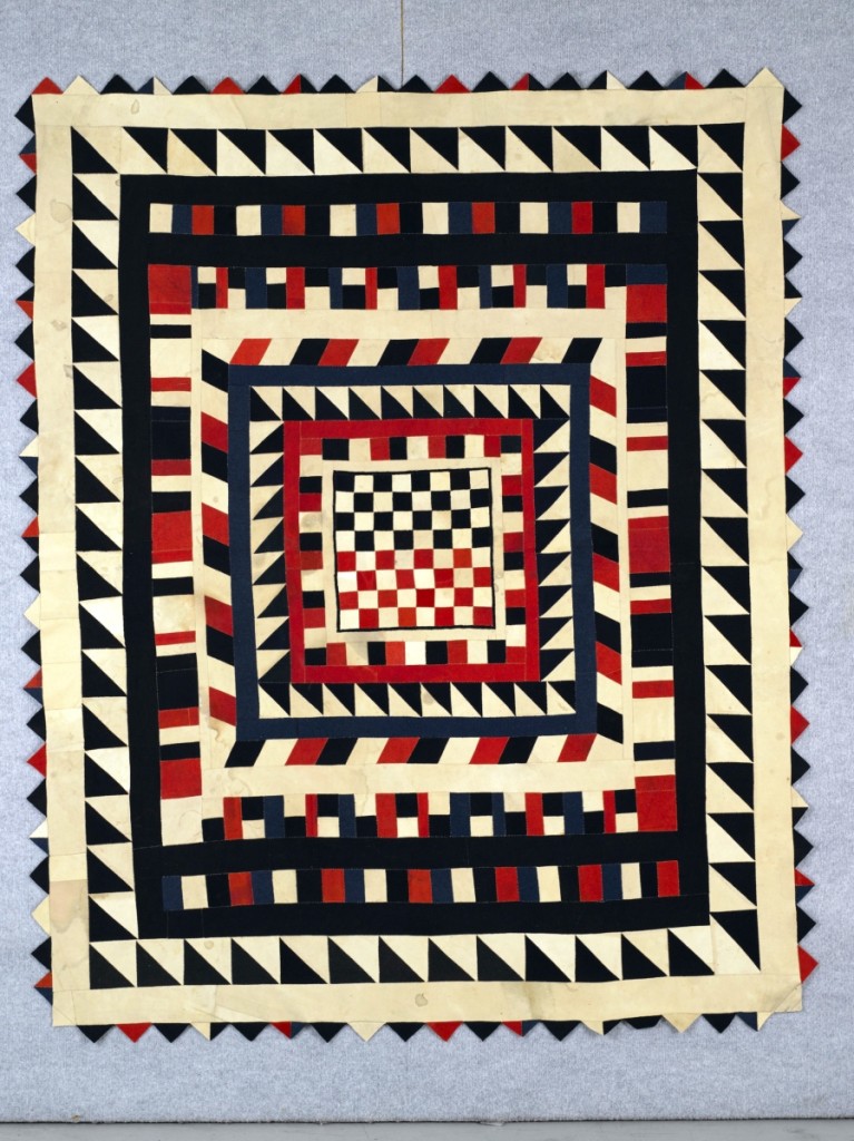 Quilt with inlaid chessboard, artist unidentified, Silesia, mid-Nineteenth Century, wool from military uniforms, 74 by 61 inches; the Annette Gero Collection. —Tim Connolly, Shoot Studios photo