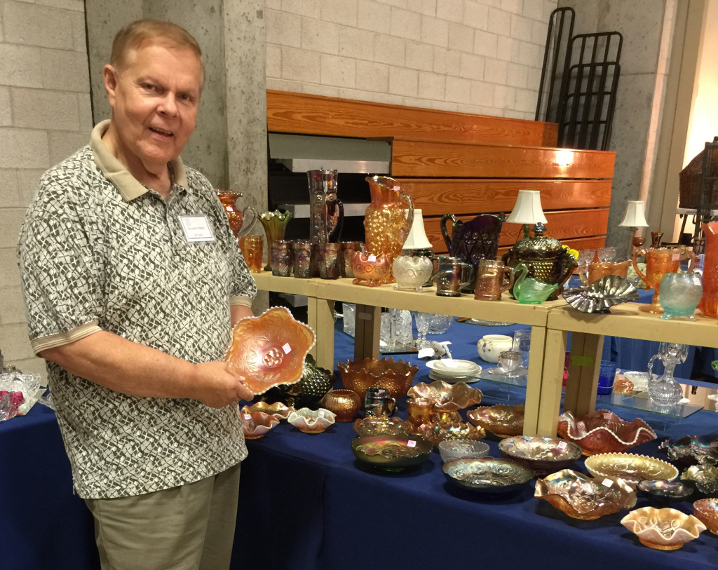 Bill Thomas, a board member of the National American Glass Club, was doing appraisals here. He is past president of the Baltimore Chapter of the National Club. From Aberdeen, Md., Thomas was showing rare carnival glass, including a scarce piece of white carnival glass.