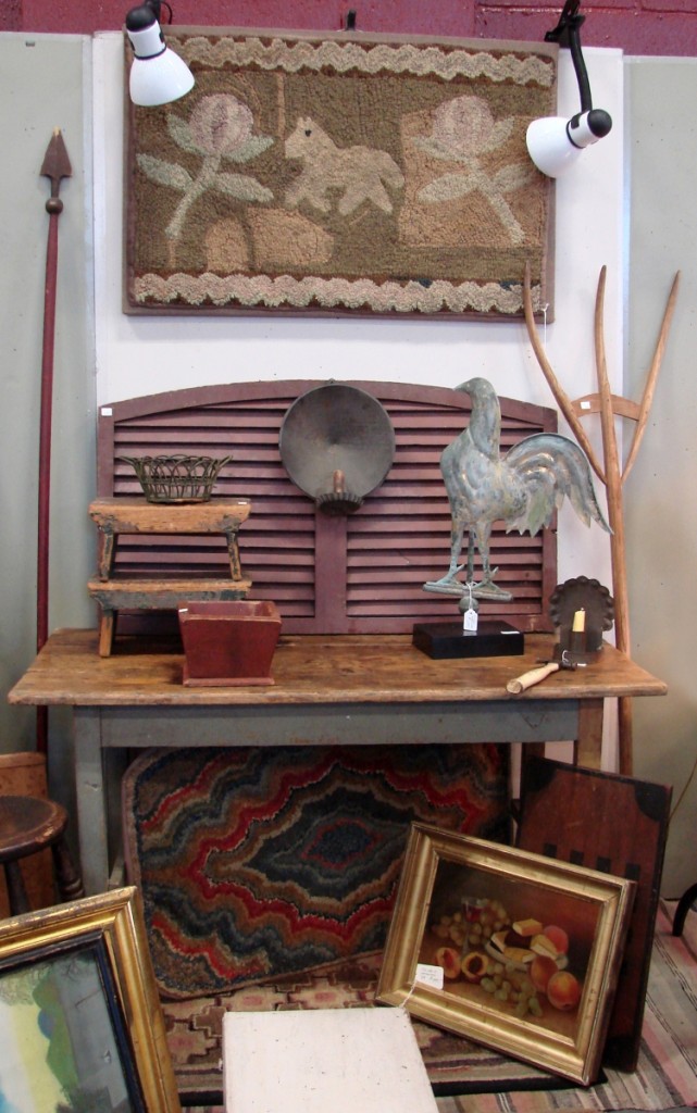 Latchpenny Antiques, Rochester, N.Y., had hooked rugs and country accessories.