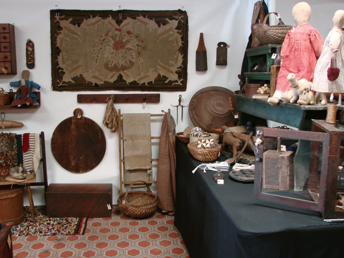 Sandy Elliott, Brentwood, N.H., brought several early cloth animals, cloth dolls, country textiles and more.