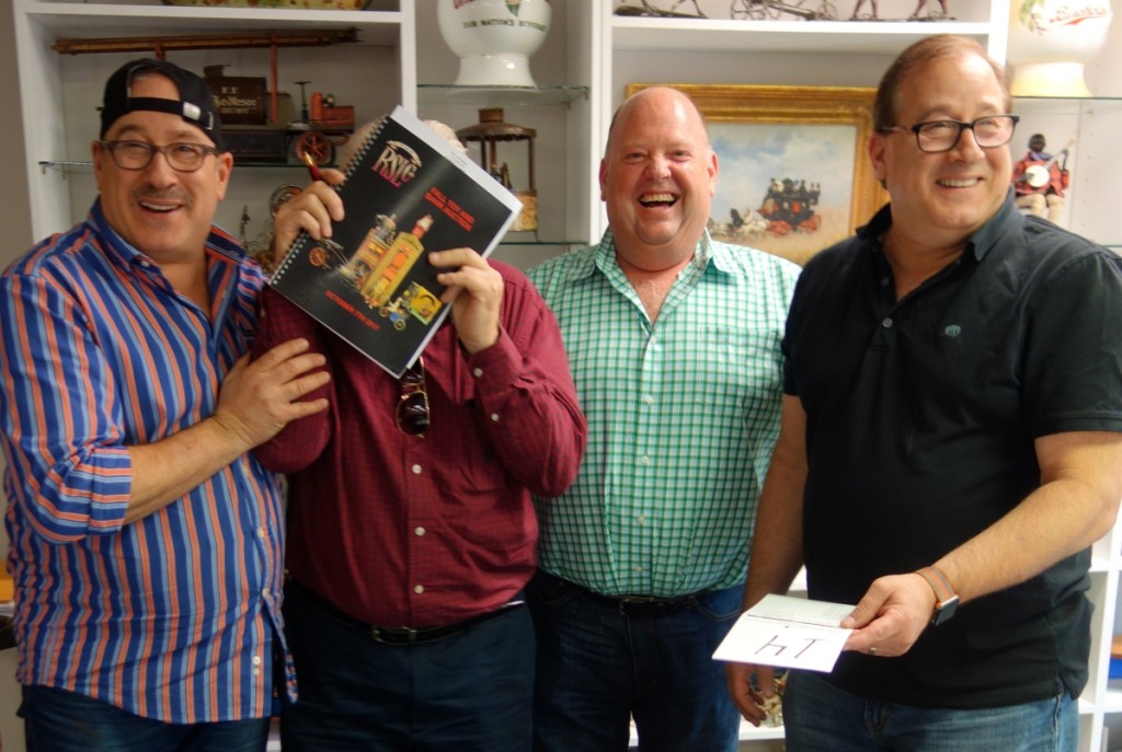 The gang that makes RSL click, visible from left, Steven Weiss, Ray Haradin, and Leon Weiss. Playing bashful is the well-known dealer/collector in the toy world, Tom Sage.