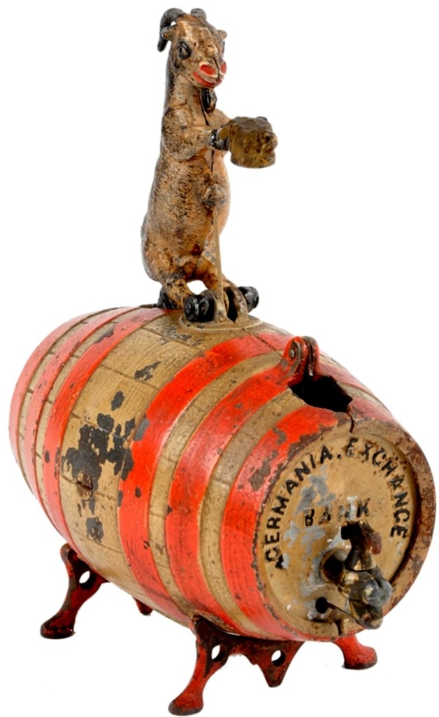 Lot 245, the Germania Exchange mechanical bank, cast iron by J&E Stevens, circa 1880s, red and tan barrel version, very good plus-excellent condition, sold just under the high estimate at $11,685.