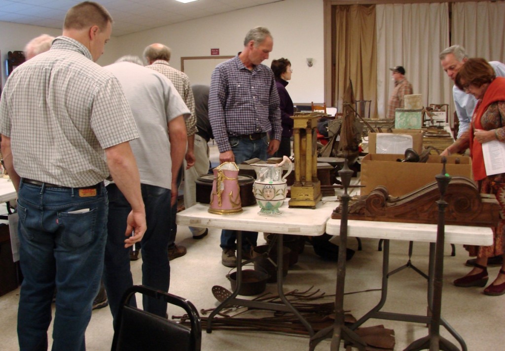 Numerous buyers were examining the offerings prior to the sale.