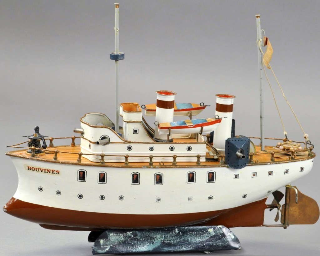 The Marklin Battleship Bouvines, a classic example of Marklin’s smaller battleships, is done in white with dark red on its lower hull and matching red stripes on the stacks. The ship has hand painted port holes and highly detailed windows, as well as an armored bridge complete with three cannons. It sold for $60,000, the high estimate.