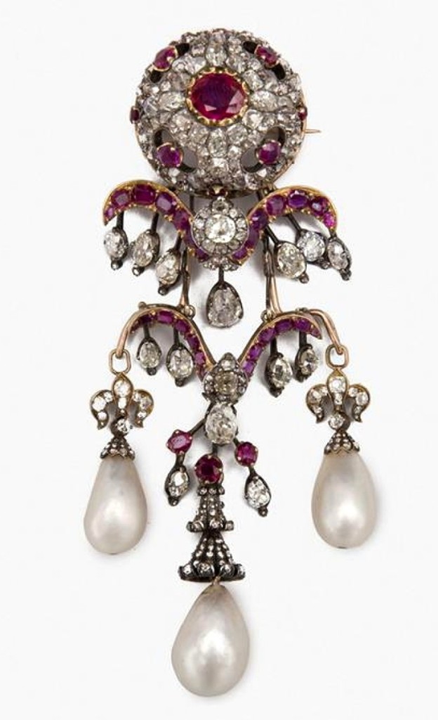 This gold, silver, ruby, diamond and natural pearl brooch once belonged to Eugénie de Montijo, wife of Napoleon III and sold for $170,800. When she and her husband fled Paris after the Franco-Prussian war, she took her jewels with her and sold this piece. It eventually came into the possession of Mrs Ernest Raphael. John Singer Sargent painted a portrait of Mrs Raphael wearing the brooch in 1905.