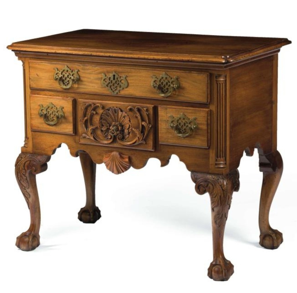 Bringing about five times the estimate, this Philadelphia carved walnut dressing table sold for $51,600. The central drawer had elaborate shell and scroll carving, and there was acanthus carving on the cabriole legs. It was one of the highest priced items.