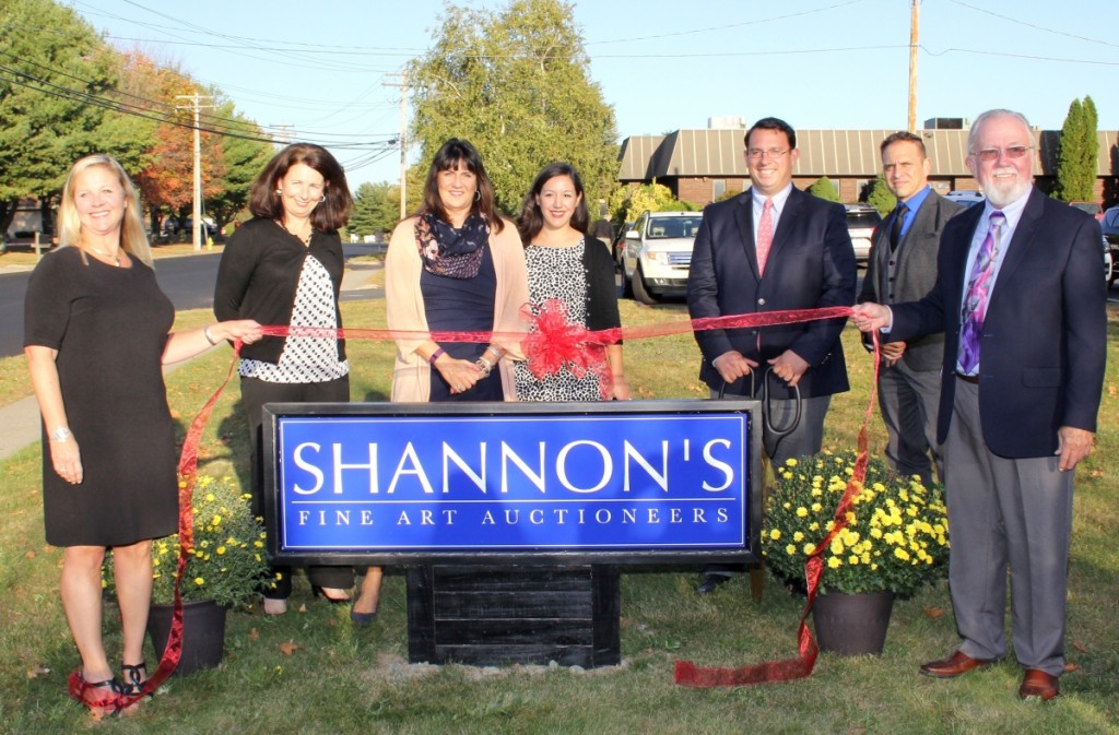 Shannon staffers gathered for the ribbon cutting with New Milford, Conn., Mayor David Gronbach.