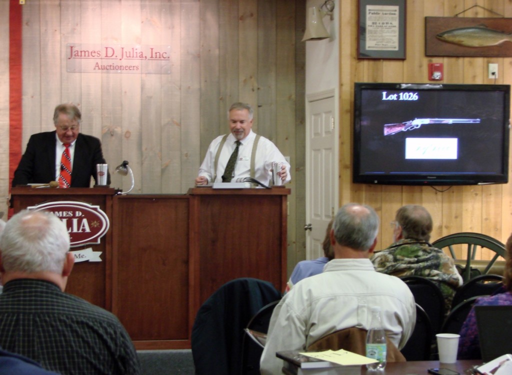 Jim Julia selling one of the “One of One Thousand” 1873 Winchester rifles.