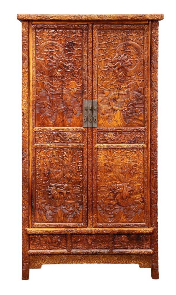 A Chinese huanghuali and mixed wood cabinet sold for $48,400.