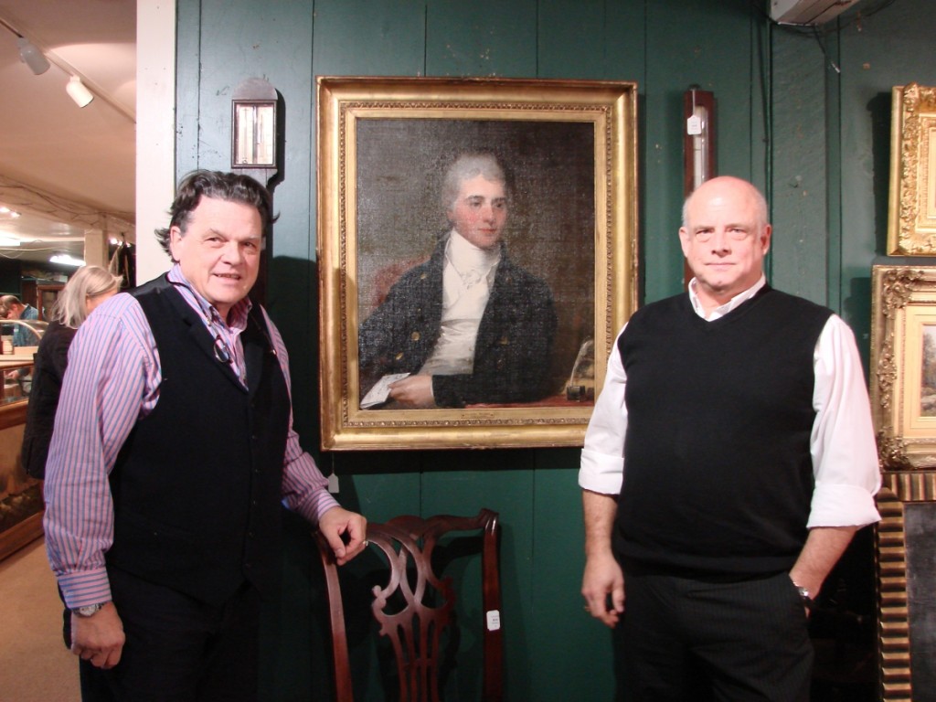 Kaja Veilleux on the left and John Bottero, vice president, on the right. Between them is the Gilbert Stuart portrait that topped the three-day sale.