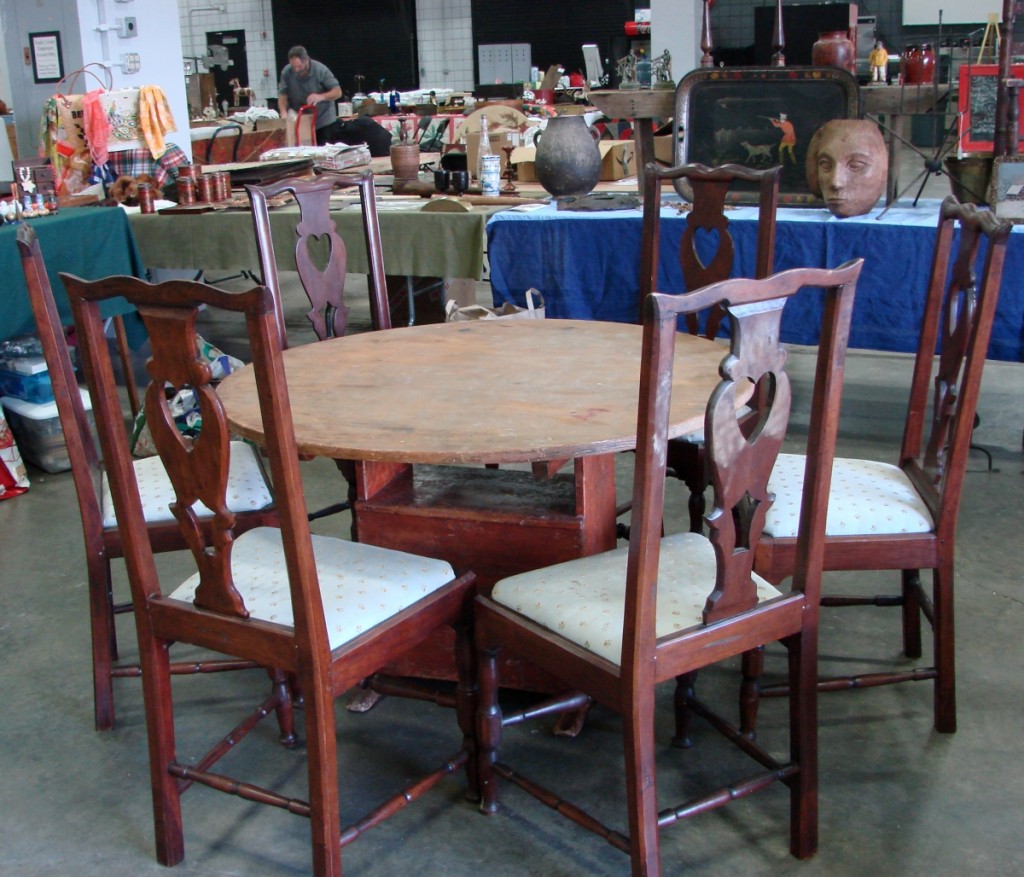 Hilary and Paulette Nolan, Falmouth, Mass., had a set of six circa 1790–1800 “Dunlap school” cherry and birch side chairs in old red paint, along with a circa 1800–20 hutch table with an old red surface.