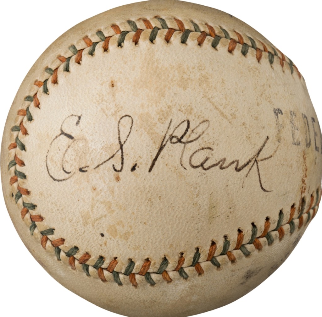 A 1915 Eddie Plank single-signed baseball was one of many spheres that sold over the $100,000 mark; this one sailed to $228,000.