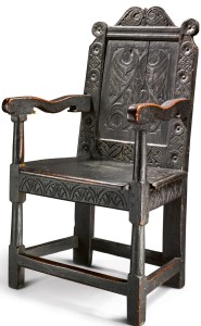 The Mansfield-Merriam family Pilgrim Century black painted carved and joined oak wainscot armchair, New Haven Colony, probably New Haven, Conn., circa 1640–1660 ($300/500,000). —Sotheby’s