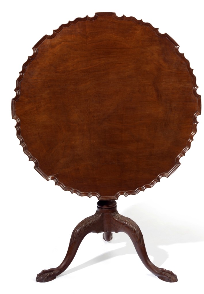 The Savage family Chippendale carved mahogany scallop-top tea table, Eastern Massachusetts, 1760–80 ($30/50,000). —Christie’s