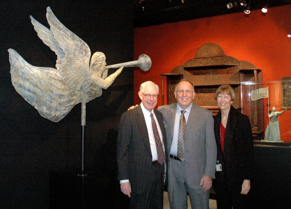 Kopelman, here with former Winter Antiques Show exhibitors Fred and Kathryn Giampietro, collects American folk art.