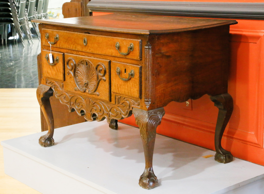 The highest priced lot in the sale, the Chippendale walnut dressing table from 1770 commanded $55,000. It originated in Lancaster, Penn., with a thumb molded top overhanging a case with shell and spandrel carved drawer, above a relief carved skirt, supported by cabriole legs that terminated in ball and claw feet. Bryson originally purchased it at Horst Auction with provenance to a Smoketown, Penn., family. The winning bidder was Pennsylvania dealer Philip Bradley. 