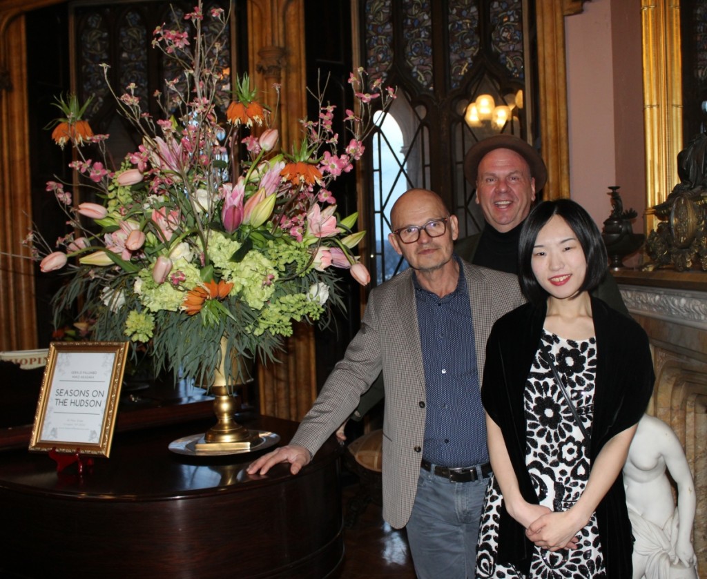 Co-creators of the Spring Blossoms event, from left, Louis Munoz, Gerald Palumbo and Kiko Akasaka of Seasons on the Hudson with one of their exuberant arrangements. Not shown, Kiko’s husband Yusuku, provided musical entertainment on the grand piano in this room.