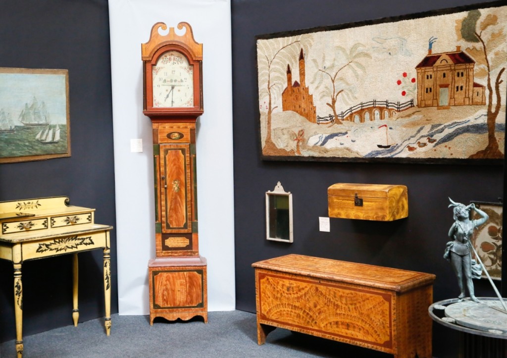 Northeast paint and color were in full bloom in the booth of Jewett-Berdan Antiques, Newcastle, Maine. Both the clock and blanket chest to the right of it hailed from Shaftsbury, Vt., from the 1830s.