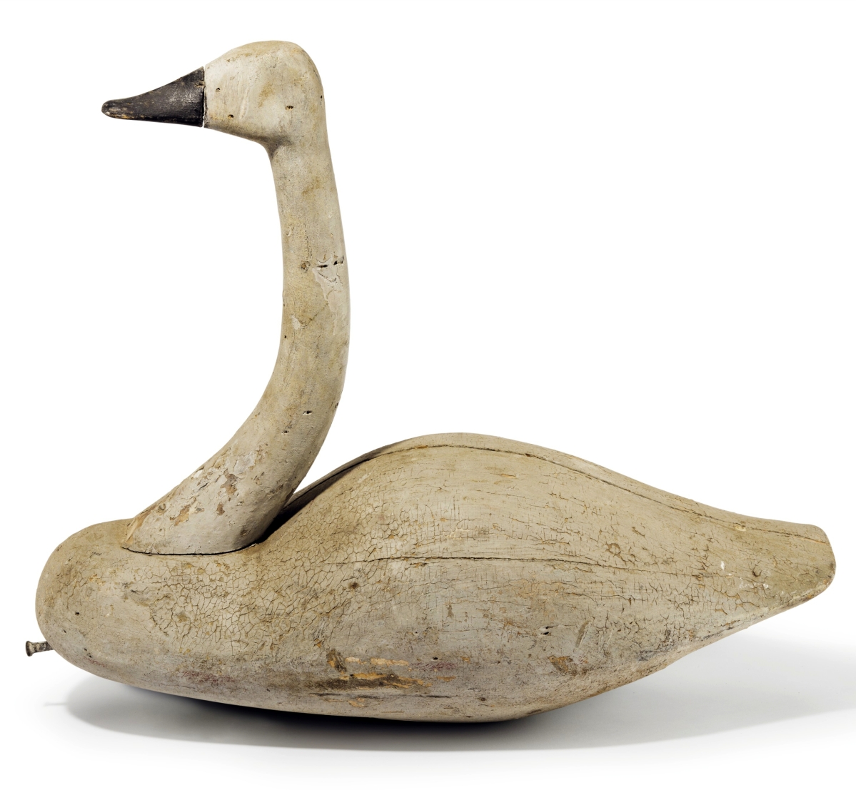 Whistling swan by John Haynes Williams (1857–1937), Cedar Island, Va., circa 1910, finished at $348,500. This set a record for a swan decoy and any decoy made by John Haynes Williams.