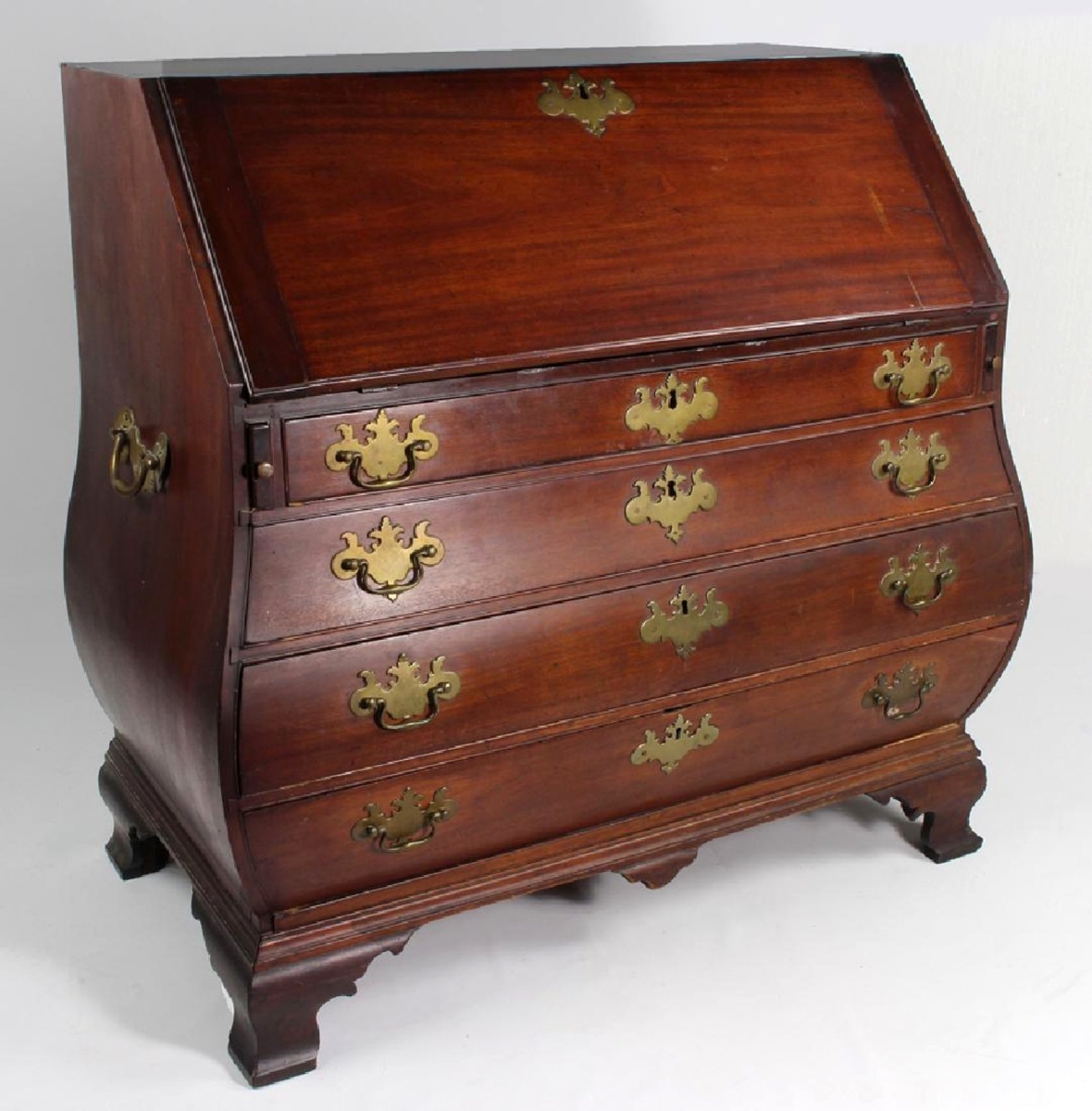 The highlight of the sale, a bombe slant-front desk brought $240,000. It was new to the market, never having been out of its home. Prior to this one, only about 14 examples were known.