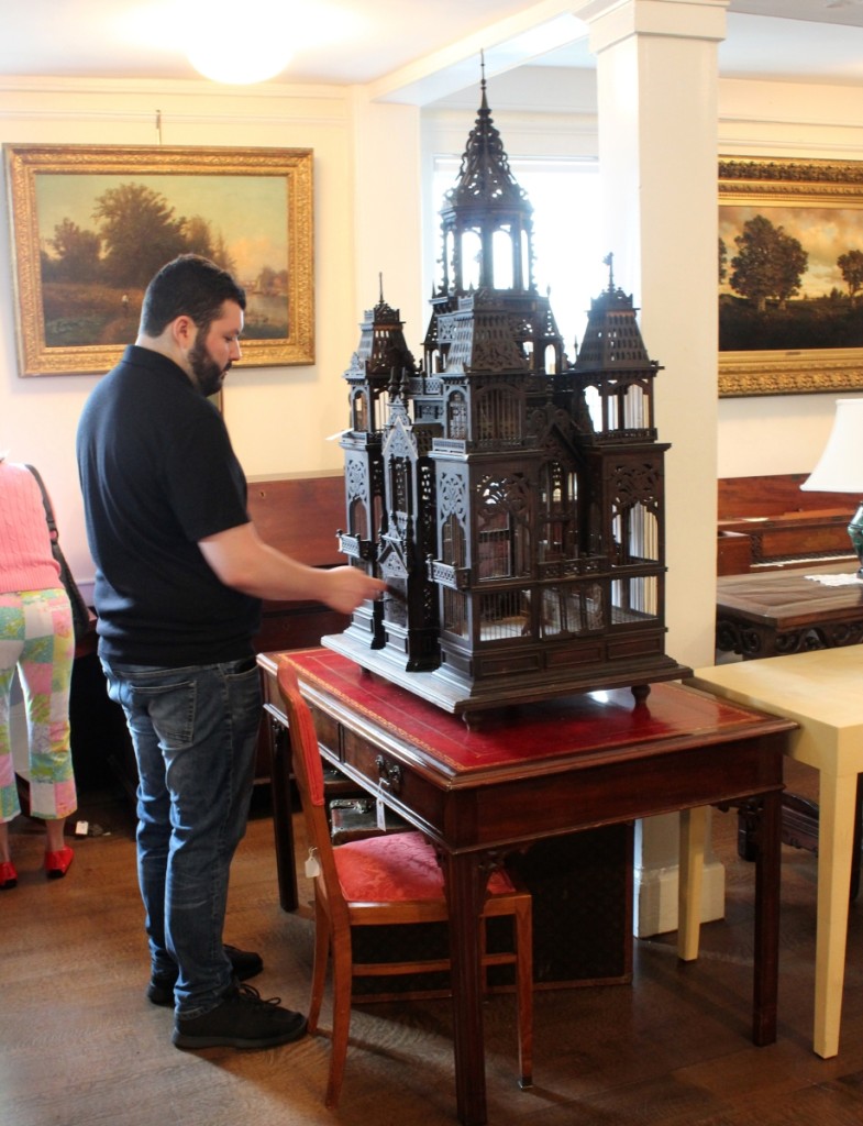 The large antique French birdcage had to be disassembled following preview to make way for seating for patrons. The late Nineteenth/early Twentieth Century, gothic design with four towers surrounding a removable central tower, later sold for $854.