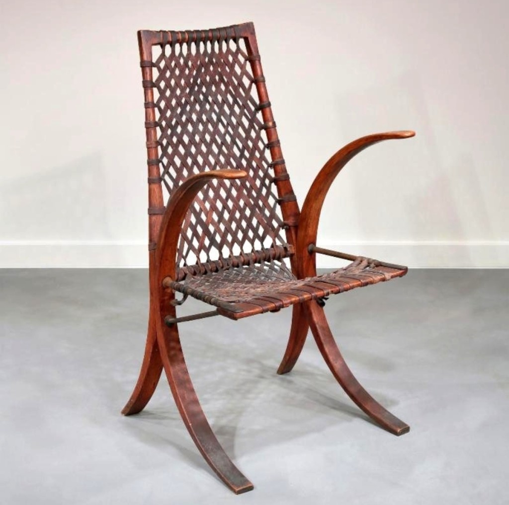 “Wagon wheel” armchair, Wharton Esherick, signed and dated 1939, oak with wrought iron and leather elements.