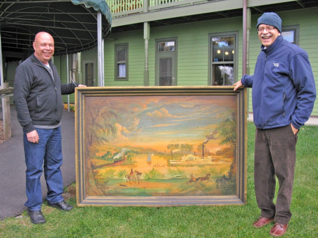Sanford Levy and Lou Petruzzelli delivering a recent acquisition to add   to the Mohonk artwork collection.