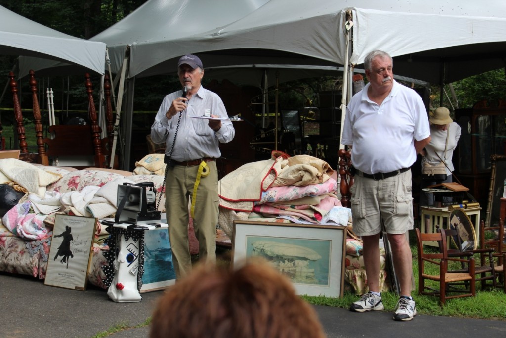 Woodbury Auction / Schwenke Auctioneer’s Thomas “Tom” Schwenke shown moments before the bidding started while he was giving the crowd some background on the collection. Standing next to him is Jon Lee of Jon Lee Auctions & Estate Sales of Eagle Bridge, N.Y. Lee and Schwenke would take turns to sell throughout the two-day sale.