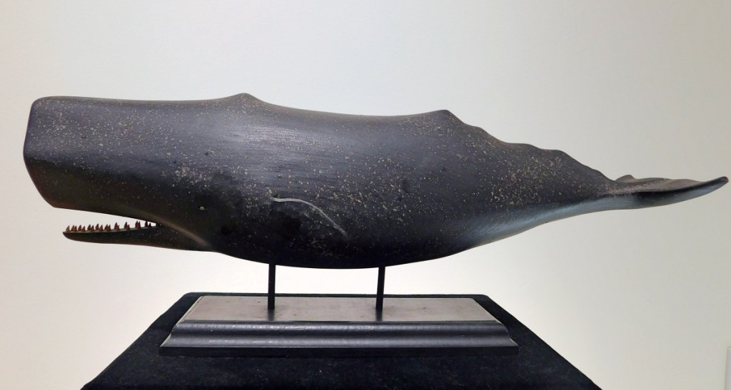 Clark G. Voorhees Jr’s father — a landscape painter — founded the Old Lyme Art Colony in Connecticut. Clark followed in his father’s footsteps by attending the Art Society of Hartford, but it was not until he later entered the Navy that he began carving whales. This full, wooden-body carving of a sperm whale, mounted on a custom stand, belonged to Ralph Cahoon.