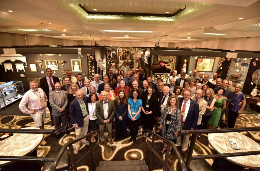 The dealers gather for their annual class photo. John Gauvin, Studio One photo