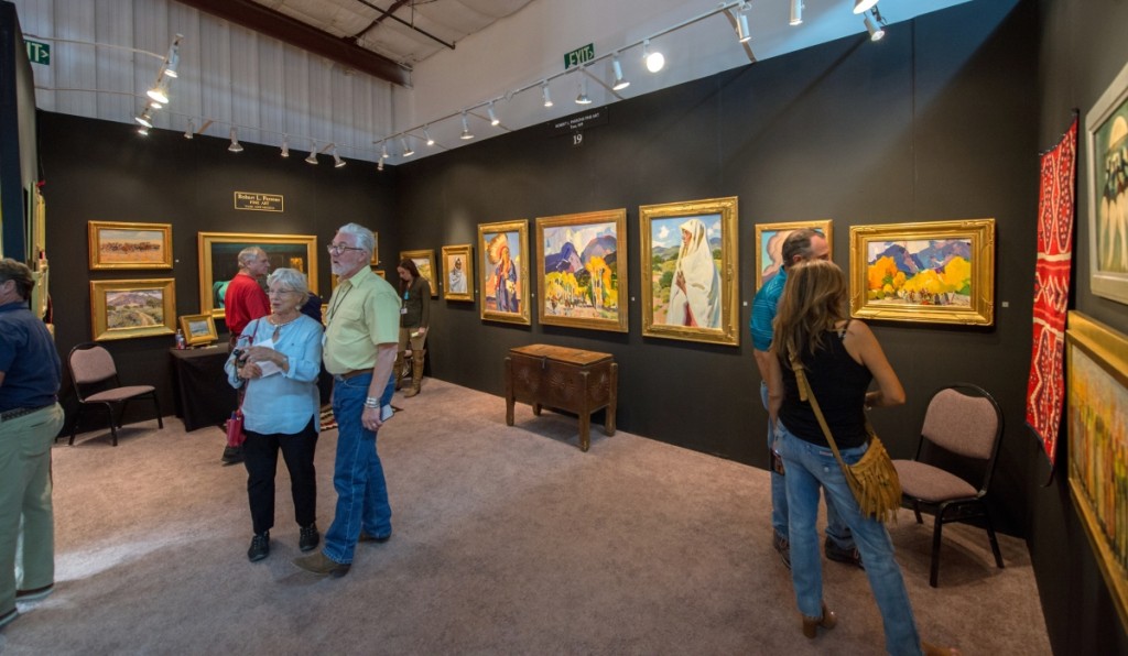 Robert L. Parsons Fine Art at the Objects of Art show, with Parsons in yellow shirt.