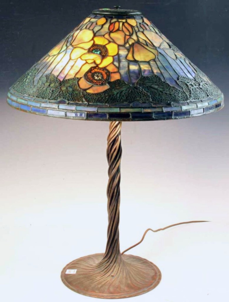 Bringing the highest price of the first day of the sale, $26,400, was a signed Tiffany table lamp with a colorful, well-mottled poppy shade, 20 inches in diameter.