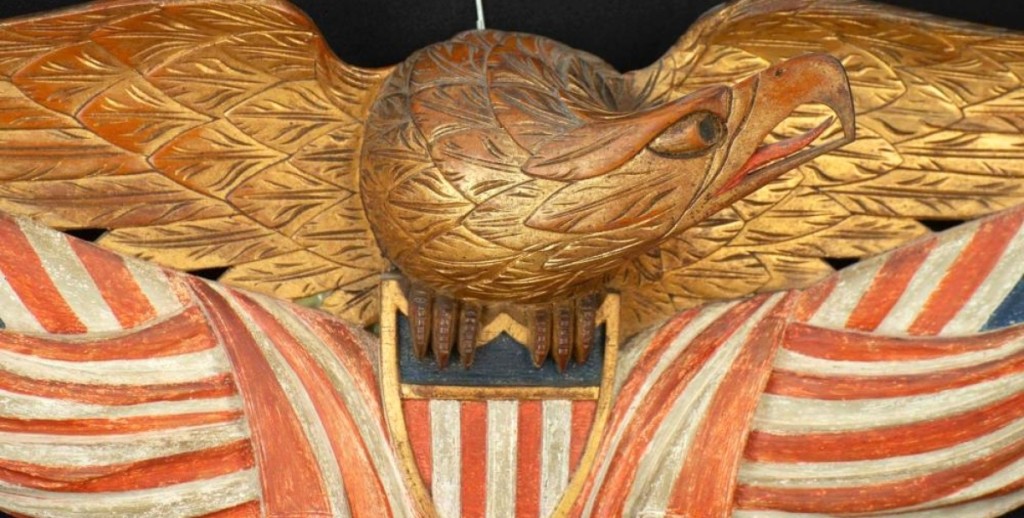 The highest priced item in the sale was this gilded Bellamy eagle, with a 25-inch wingspan, carved above a shield with two American flags. It sold to a phone bidder for $42,000. At one time, the flags had been painted over but that paint was removed to show the original colors.