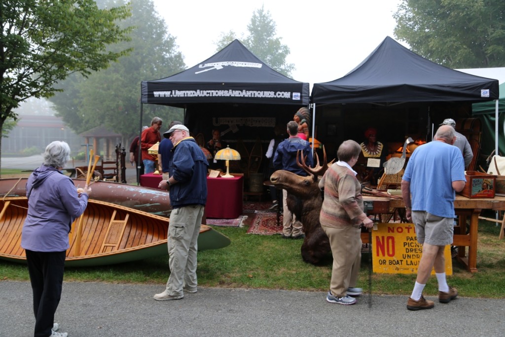 Buyers were flocking around the booth of United Auctions, Olean, N.Y.