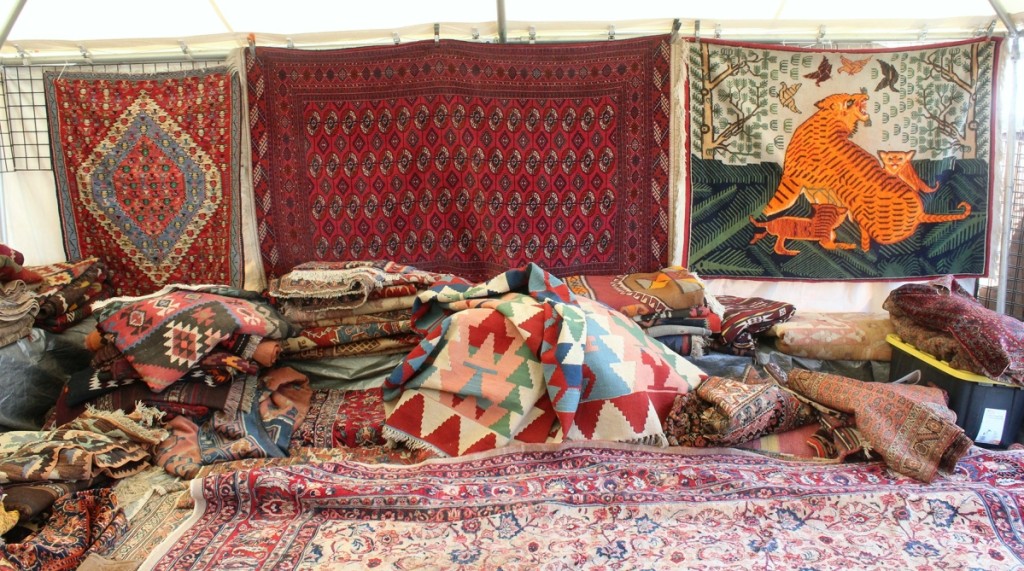 Hindu Kush, Inc, set up a nice display of Oriental rugs and carpets at Faxon’s Midway.
