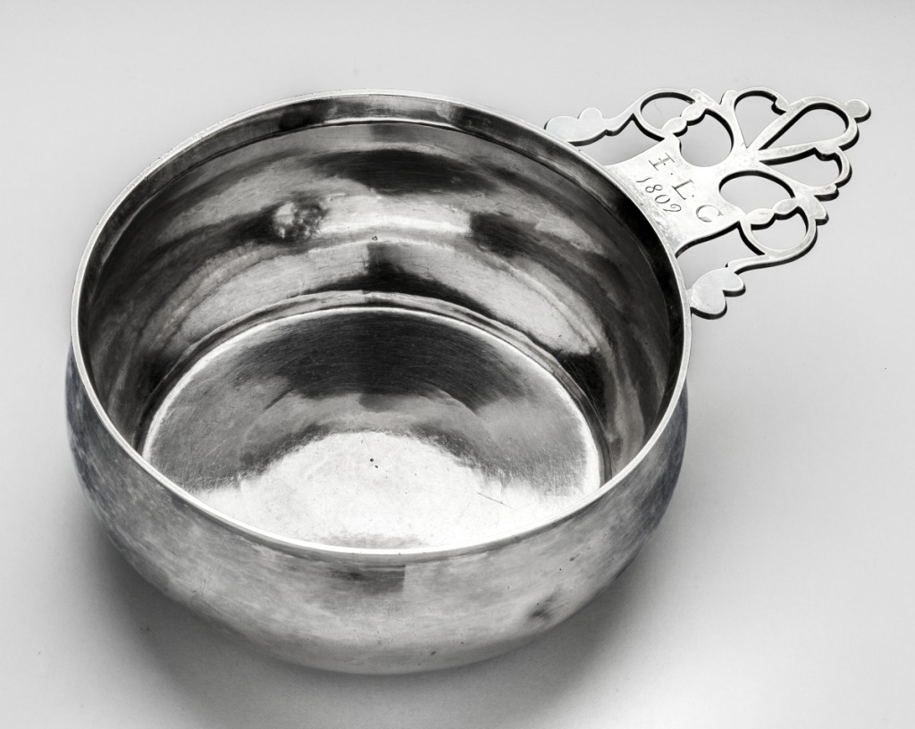 Porringer with keyhole handle, marked by shop of Elias Pelletreau with stamp Mark 4; made by John Pelletreau (1755–1822), 1802. Engraved on handle obverse in block letters “JLG/1802” for John Lyon Gardiner (1770–1816). Silver; height 2 inches, length 7½ inches. Courtesy of Suffolk County Parks, Division of Historic Services. Photo Glenn Castellano.