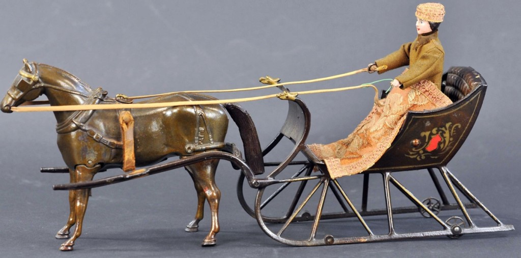 A bid of $47,500 opened the competition for the Ives Cutter Sleigh with Rider, a circa 1893 toy considered by many collectors the finest toy ever produced. Bidding from the internet, phones and in the gallery brought a price of $144,000. This toy, in near mint condition, has been in a number of important toy collections including Hegarty Collection, Pearlman Collection and the Max Berry Collection.
