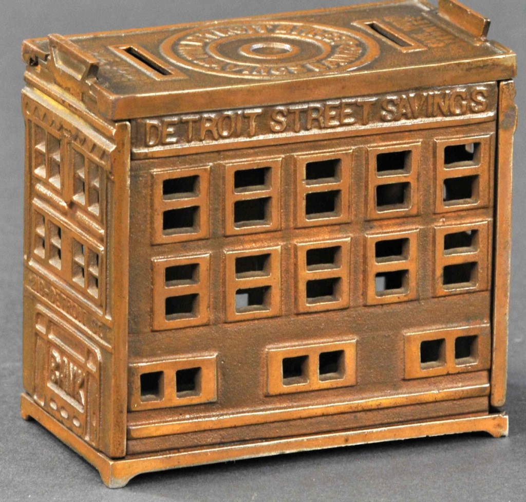 The bidding for the Detroit Street Savings still bank, possibly one-of-a-kind bank, started at $4,500 and ended at $12,000, surpassing the $9,000 high estimate. This bank, measuring only 4½ inches high, is in pristine condition.
