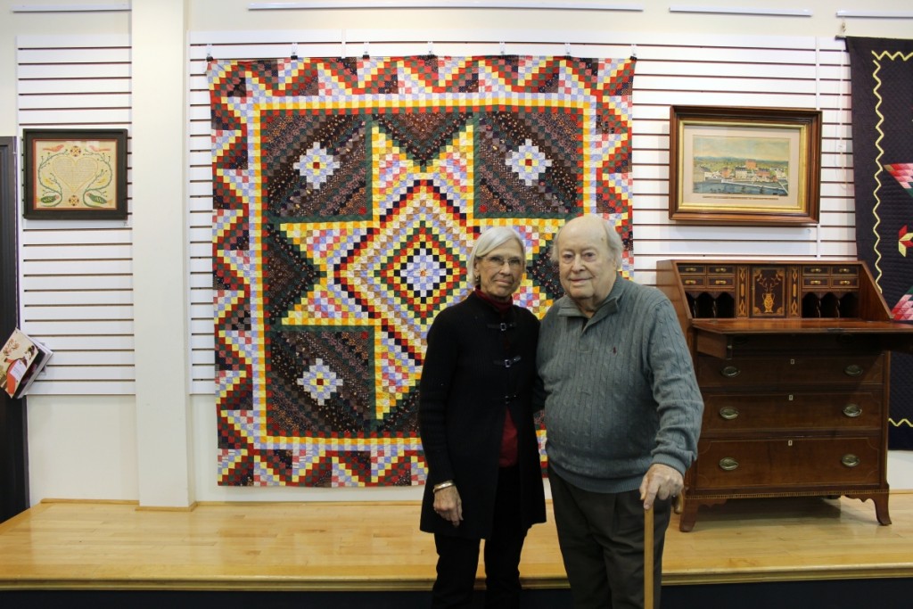 Rita and Paul Flack shown the night of the preview party with a stunning and vibrant early Twentieth Century Bowmansville star quilt. Estimated at $500–$1,000 to generate competitive bidding, it did just that, closing at more than ten times the low estimate, at $5,612.