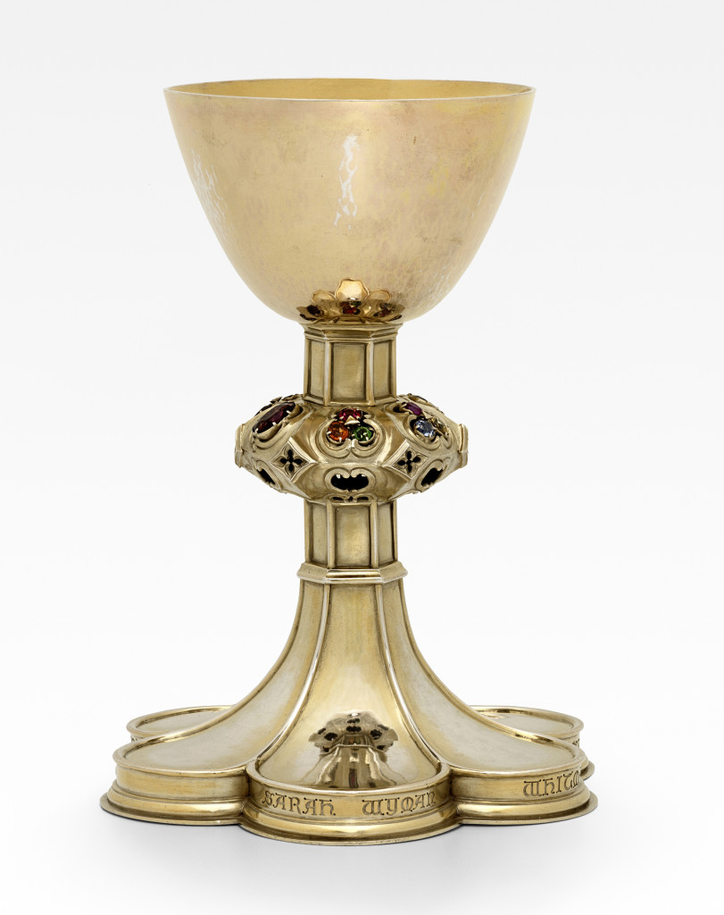 Whiteman (1842–1904) was a painter, designer of book covers, stained glass artist and founding member of the Society of Arts and Crafts in Boston. Fine metalsmiths created  chalices, croziers, and other ritual objects for church use. Sarah Wyman Whitman Memorial Chalice by Arthur Stone (1847–1938) and William Blair (active about 1908–1909), designed by R. Clipston Sturgis (1860–1951), 1905. Gold-plated silver, set with jewels (alexandrite chrysoberyl, sapphire, tourmaline, cat’s eye chrysoberyl, citrine quartz, spinel, pyrope garnet, grossular garnet [hessonite], pink sapphire and yellow sapphire). Lent by Trinity Church, Boston. Photograph © Museum of Fine Arts, Boston. 