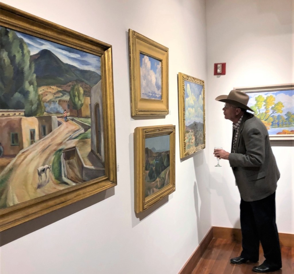 Left, the 1934 oil on canvas “Spanish Village” by Arthur Helwig (1899–1976) fetched $5,850. Right, the 1946 oil on board “Autumn (Smoky Hill River, Kansas)” by Birger Sandzen (1871–1954) collected $23,400.
