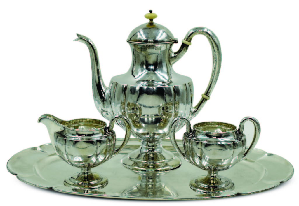 Tea set designed by Clara Barck Welles (1868–1965) and presented to Harry Logan Monroe, manufactured by the Kalo Shop, Chicago, 1928. Sterling silver; teapot height 11 inches. Collection of Melissa Monroe Dockum.