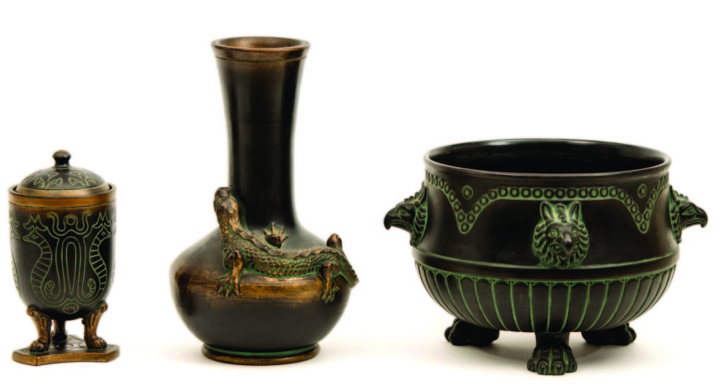 From left, a covered urn, lizard vase and jardinière manufactured by Norse Pottery Company, Rockford, Ill., 1903–12. Glazed earthenware; vase height 12¼ inches. Collection of John Danis.