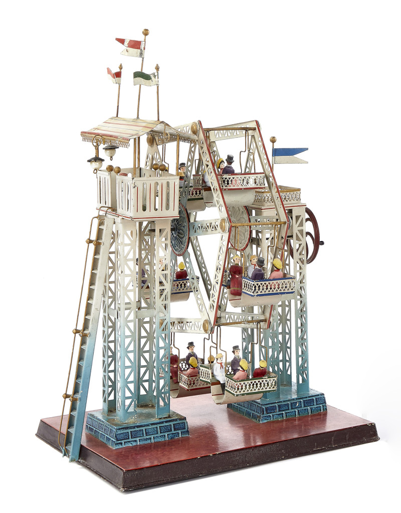 The Morton A. Hirschberg collection of steam toys, 121 lots, did well and was highlighted by Lot 401, Doll & Cie painted tin Ferris wheel steam toy with composition figures, largest of the Ferris wheels with six seats each with four riders. It measures 17 inches high, 13½ inches wide and 11 inches deep. The phone bidders were very active on this lot, one winning with a bid of $21,960. It carried a high estimate of $11,000.