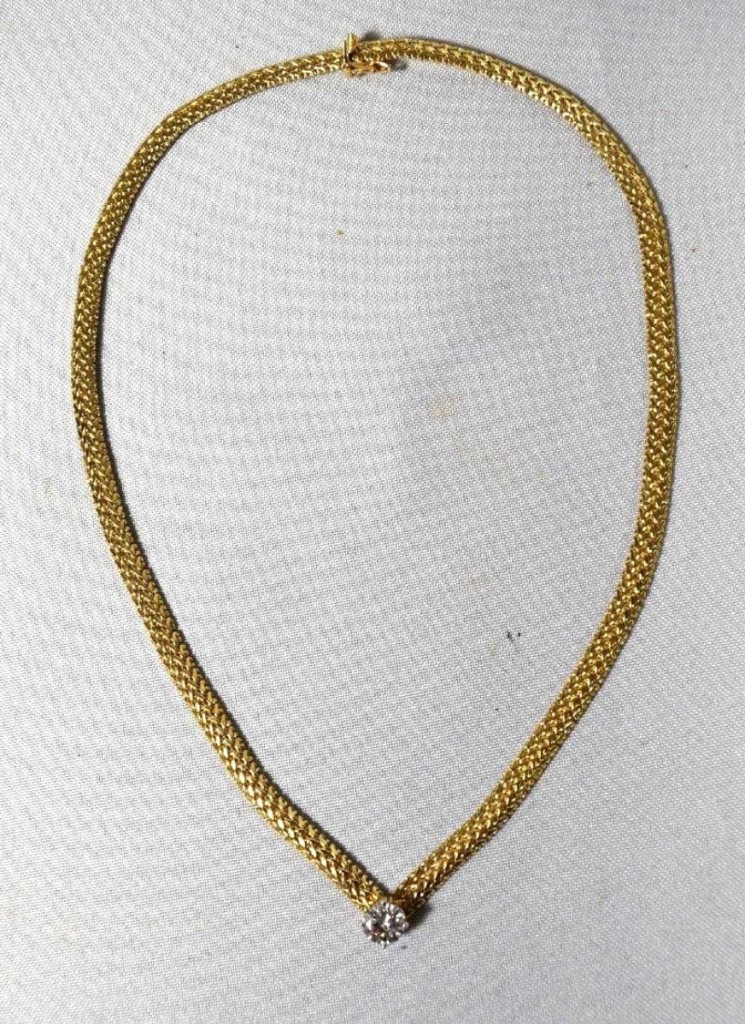 Bringing the highest price of the sale, $6,960 ,was a 14K yellow gold necklace with a diamond of approximately 1.5 carats.