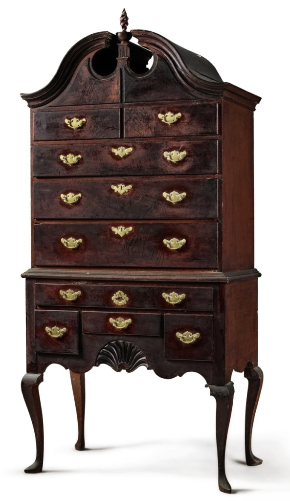 The highest selling piece of furniture among Sotheby’s sales during Americana Week was the Samuel Whitehorne carved mahogany bonnet top high chest of drawers, attributed to the Goddard-Townsend school of Newport, R.I., circa 1760. It appeared to retain its original surface and brasses and was pursued by three dealers in the room as well as on the phone before going to a trade bidder in the room for $543,000 ($150/300,000).