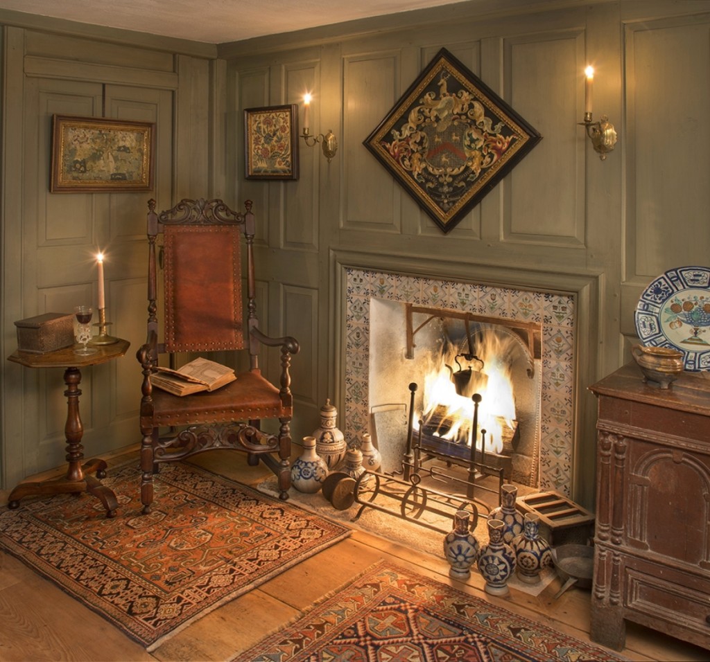 A private collector’s interior featuring stoneware, Oriental rugs,   needlework and early furniture. Ashworth used the light from the fire   to give the room an authentic glowing effect.