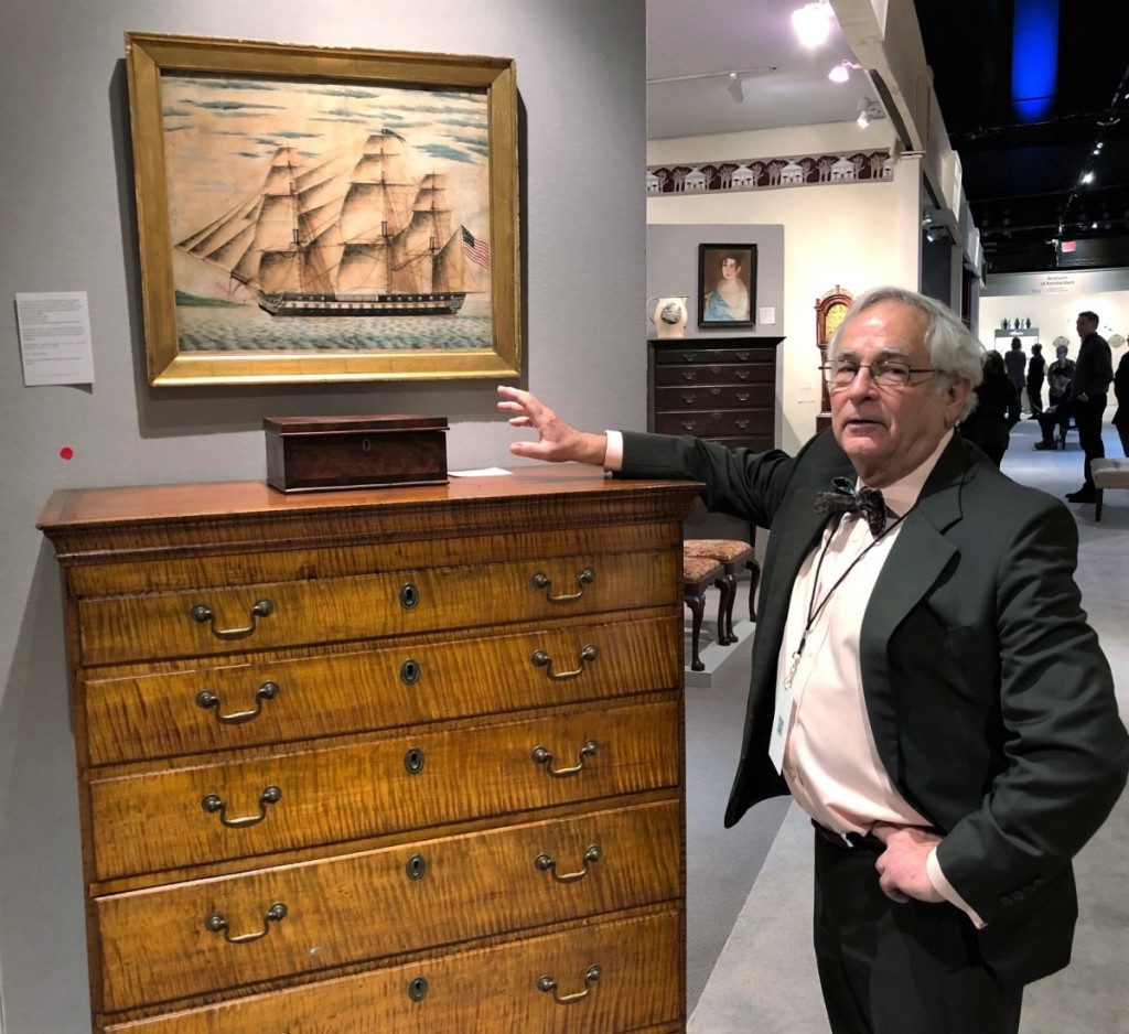 Connecticut dealer Arthur Liverant sold his tall chest of drawers in figured maple. The unsigned circa 1804-17 watercolor above it depicts the USS frigate President, a warship designed by Joshua Humphries in 1794 and built at the Christian Bergh Shipyard on the East River in New York City in 1800.